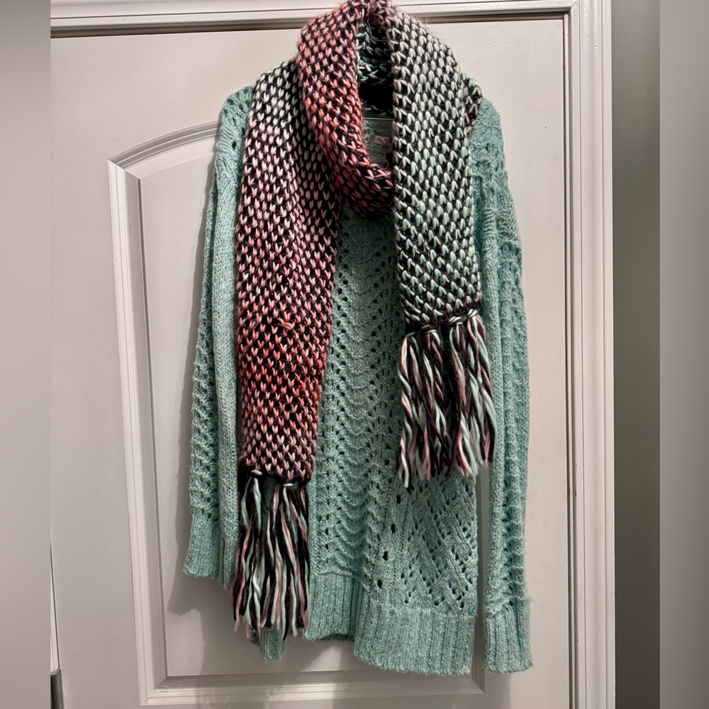 Maurice’s sweater and scarf